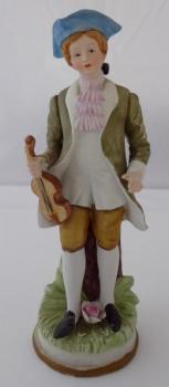 Hand-painted statue of a violinist Hand-painted statue of a violinist