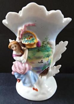 Vase with a figure of a girl and a basket Vase with a figure of a girl and a basket