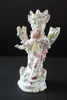 Figural stand with young men Figural stand with young men